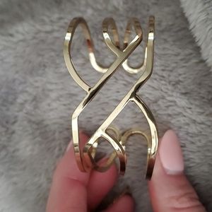 Gold colored cutout cuff